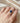 Halo Ring with Natural Blue Sapphire and Diamonds in 18K Gold