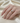 Anillo con un diamante central acentuado con 12 diamantes